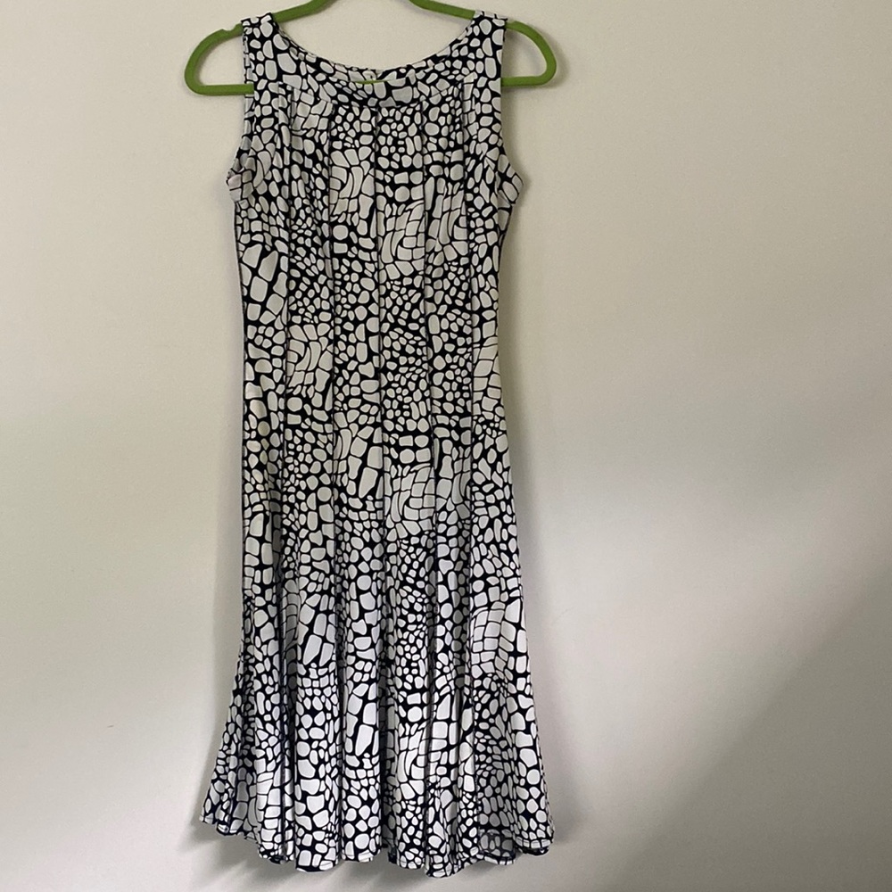 Medium dress. Black and white. Can be worn for work or out. With heels or wedges